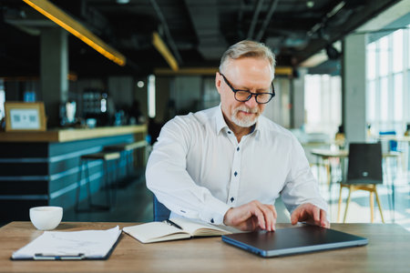 Middle-aged director, mature director, man works in the office.の写真素材