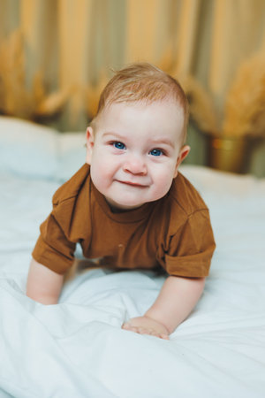 Baby in cool casual clothes. Little stylish boy, child 1 year old in jeans and t-shirt. Stylish...