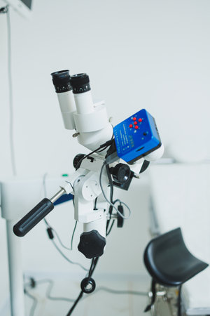 Modern medical equipment microscope in a bright office. Apparatus for diagnostics.