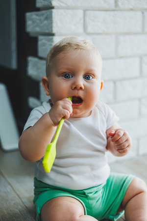 A toy baby at home for development or learning, a child in the bedroom for motor development. A small child of cognitive development.の写真素材