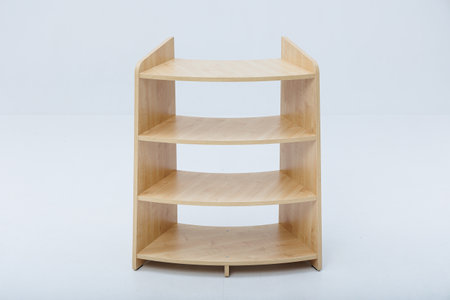A beautifully crafted wooden shelf consisting of three sturdy shelves, set against a clean, white background that enhances its natural aestheticの写真素材