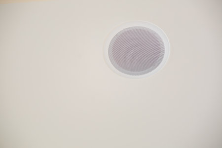 This stylish ceiling vent has been meticulously designed for optimal air circulation in contemporary interiorsの写真素材