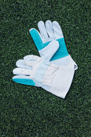 These durable sports gloves are crafted with breathable fabric that ensures maximum comfort and grip. They are truly ideal for various outdoor activities and sports performancesの写真素材
