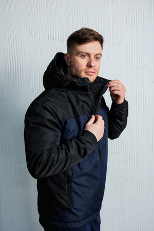 This durable mens outdoor jacket is designed to keep you warm and comfortable in cold weather conditions, offering excellent insulation for your hiking adventures and casual wearの写真素材
