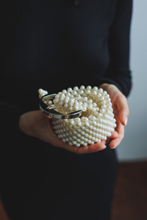 Exquisite pearl belt for an elegant look. Women's pearl belt. Stylish women's accessories.の写真素材