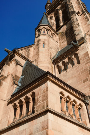 Ancient city buildings. Ancient brick church. Catholic cathedral made of stone.の写真素材