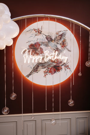 Red photo zone for birthday celebrations. Large elegant photo zone with lighting.の写真素材