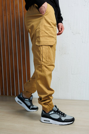 Men's green casual sweatpants with pockets. Lightweight summer pants for men.の写真素材