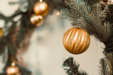 This stunning gold ornament with intricate designs enhances your holiday decor, creating a warm, festive atmosphere that brings joy and embodies the seasons spiritの写真素材