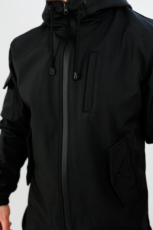 Discover our stylish black jacket, expertly designed for practicality and fashion. Ideal for outdoor adventures and casual outings, it blends comfort with contemporary styleの写真素材