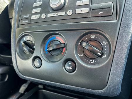 This image showcases a detailed car HVAC control panel, emphasizing key climate control features that optimize comfort and improve the vehicles overall functionalityの写真素材