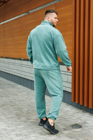 Experience the comfort and style of this fashionable fleece tracksuit, ideal for casual outings and workouts. Perfect for those who value fashion and functionalityの写真素材