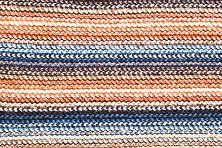 rough knitted textured textile striped material backgroundの写真素材