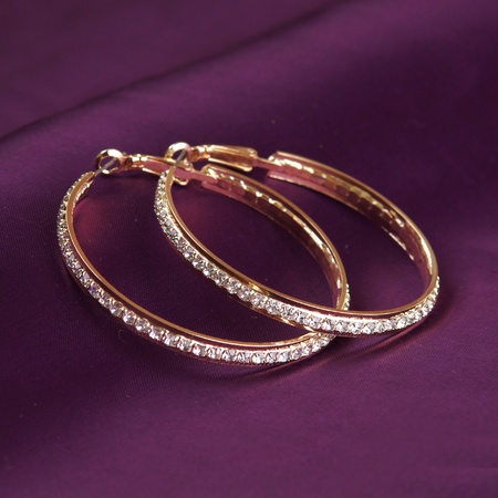 golden earringsの写真素材