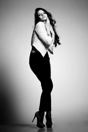 studio fashion portrait of young beautiful brunetteの写真素材