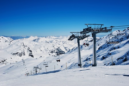 Slopes and ski lifts at ilpine skiing resort at Mayrhofen, Austriaの写真素材