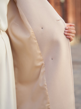 Lining on the inside of the beige coat hemの写真素材