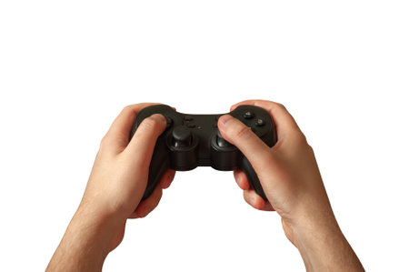 A man plays holding a joystick on a white background. Isolated
