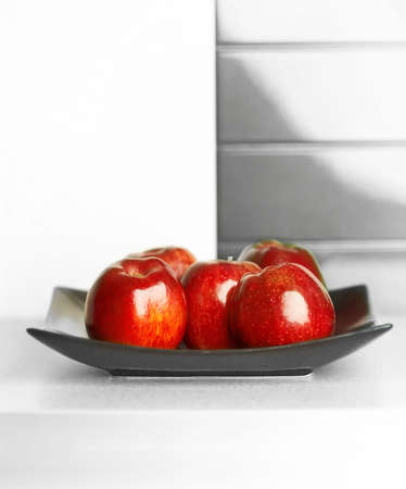 Granny smith apples on table in modern kitchenの写真素材