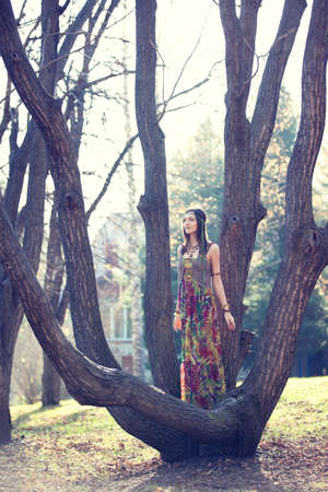 Hippie Girl and treeの写真素材