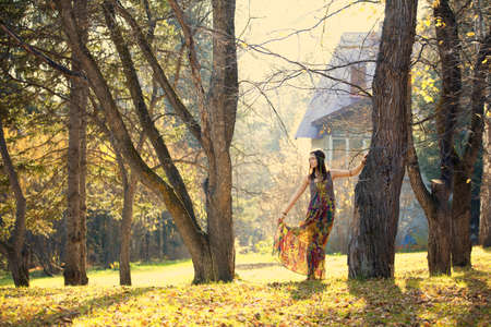 Hippie Girl at home and treesの写真素材