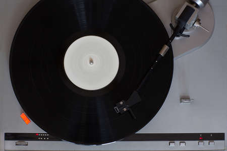 Vinyl player. The rotating diskの写真素材