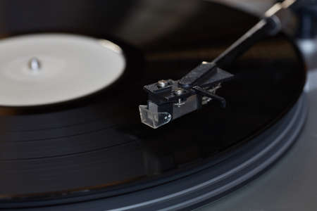 Vinyl player. The rotating diskの写真素材
