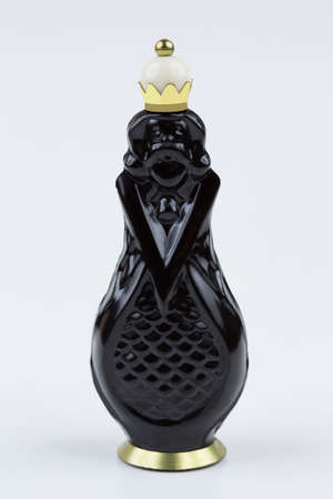 Glass chess pieces on a white backgroundの写真素材