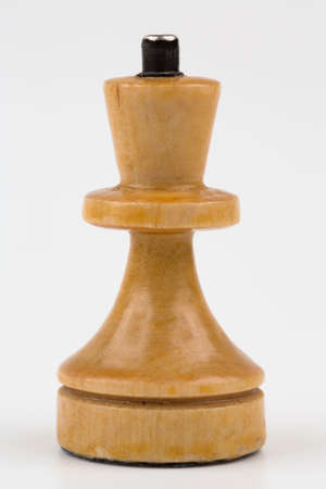 Wooden chess pieces on a white backgroundの写真素材