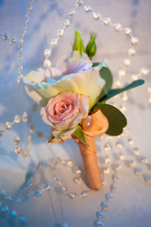 Men's Wedding boutonniere on a blue backgroundの写真素材