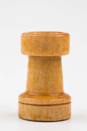 Wooden chess pieces on a white backgroundの写真素材