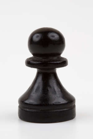 Wooden chess pieces on a white backgroundの写真素材