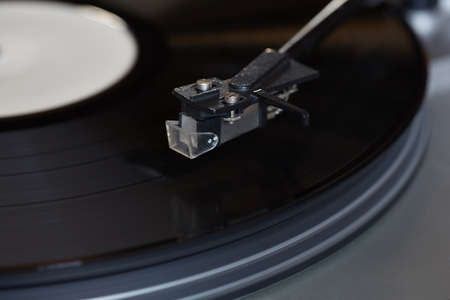 Vinyl player. The rotating diskの写真素材