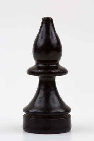 Wooden chess pieces on a white backgroundの写真素材