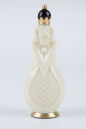 Glass chess pieces on a white backgroundの写真素材