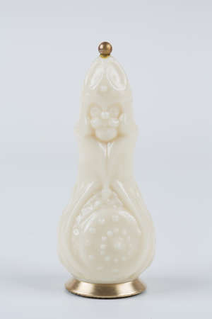 Glass chess pieces on a white backgroundの写真素材