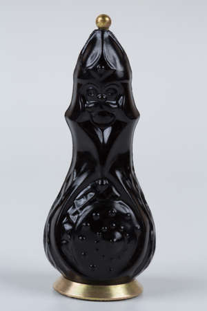 Glass chess pieces on a white backgroundの写真素材