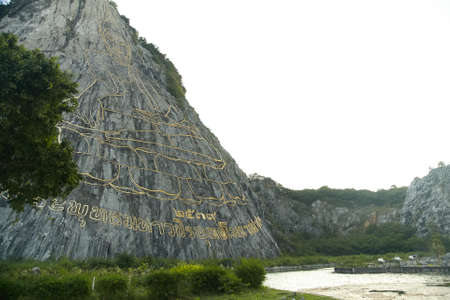 Buddha images on the rock. Thailand.の写真素材