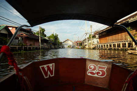 A boat trip around the village on the water.の写真素材