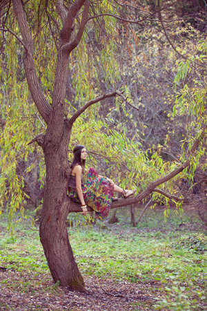 Hippie Girl and treeの写真素材