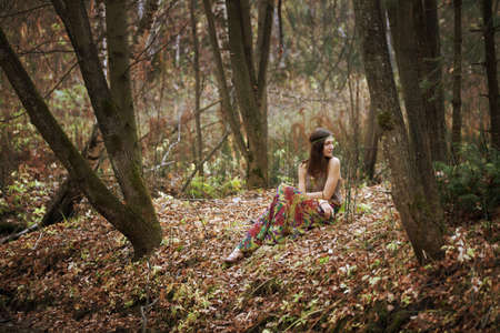 The girl in a dark forestの写真素材