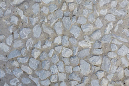 Gray stones in concrete. Texture.の写真素材