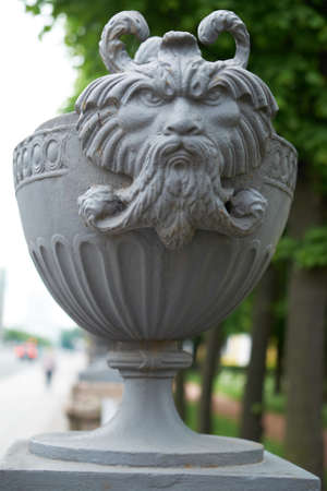 Ancient vase. Decoration on the fence.の写真素材