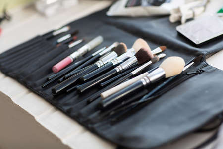 Wedding makeup brushes on the table.の写真素材