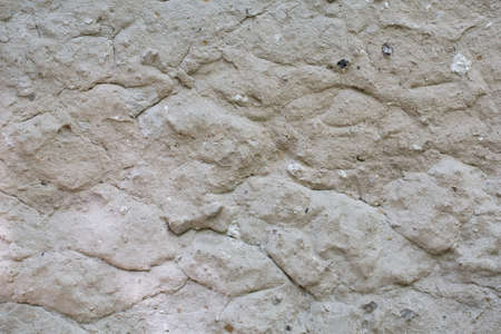 Dry soil covered with cracks on the surfaceの写真素材