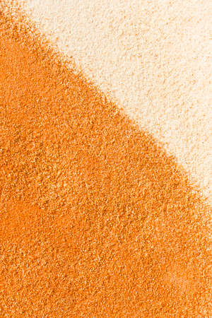 Close up sand background. Texture of white and yellow sands. の写真素材