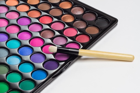 Colorful eye shadows palette with professional makeup brush の写真素材