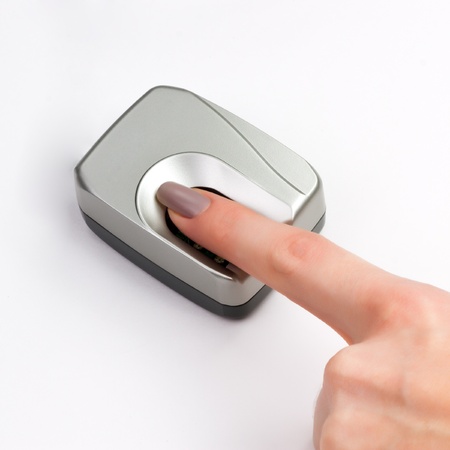  Index finger on a biometric scannerの写真素材