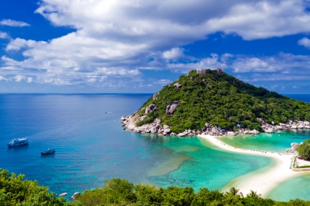 Beautiful tropical island against blue sky with clouds  Koh Phangan island, Kingdom of Thailandの写真素材