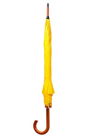 Yellow umbrella isolated on white backgroundの写真素材